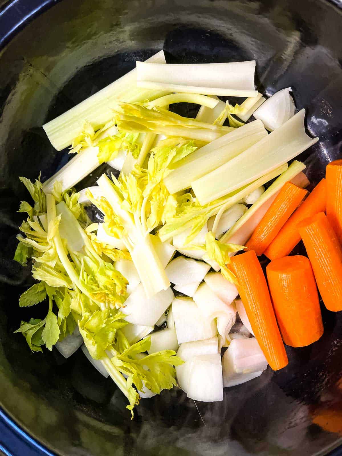 Chopped veggies in the IP Dutch Oven to saute.