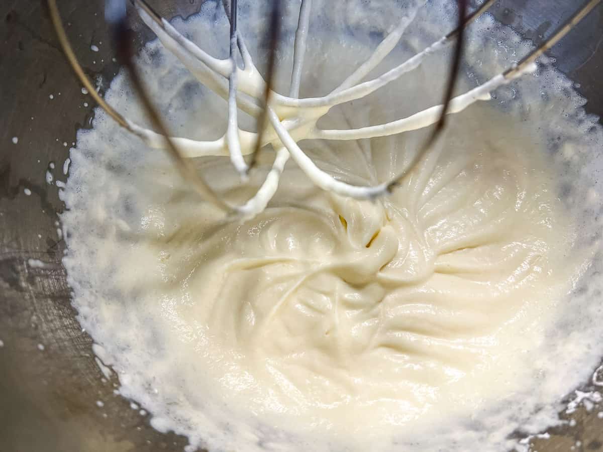 Whipping the whipping cream for the topping.