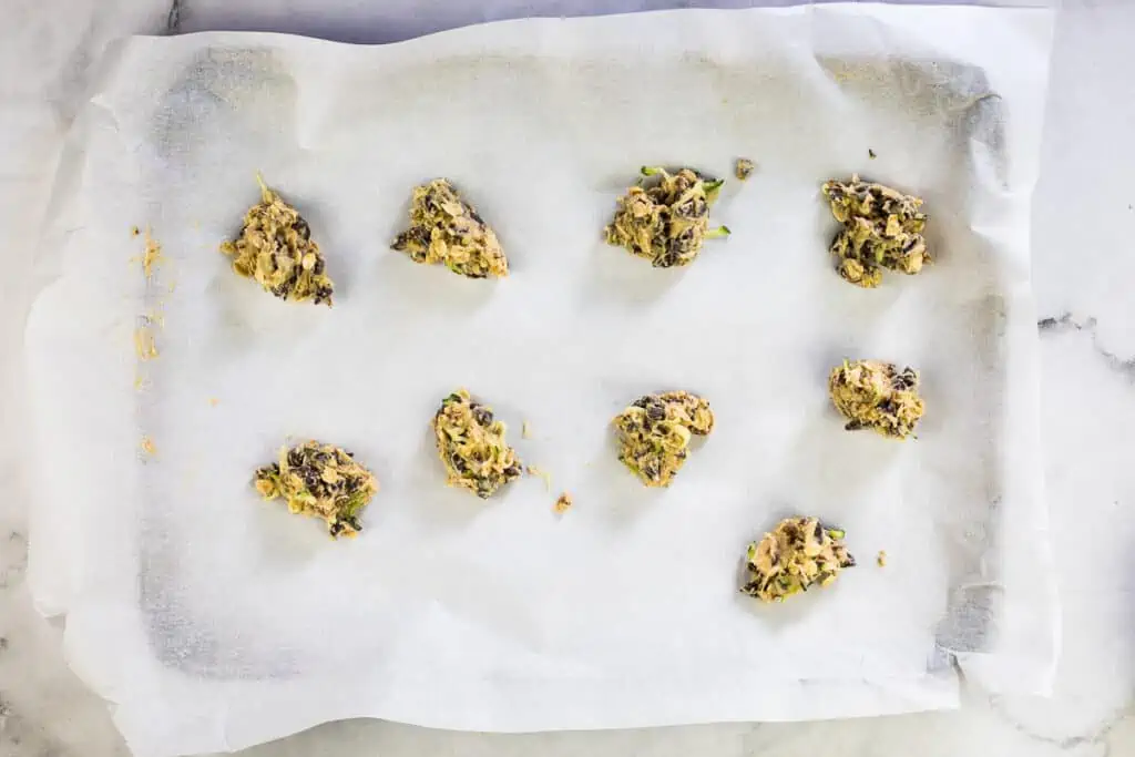 Cookie dough on a baking sheet.