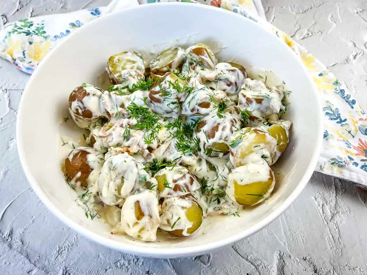 Potatoes tossed with sour cream mixture.