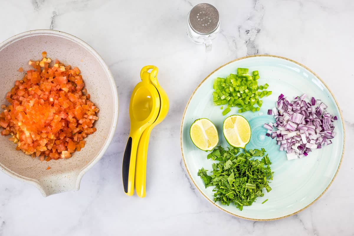 Prepped ingredients on a plate and in a bowl.