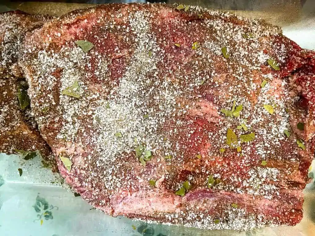 Brisket rubbed with the cure and ready for refrigeration.