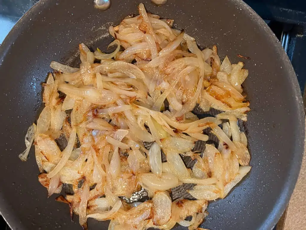 Caramelized onions in a skillet.