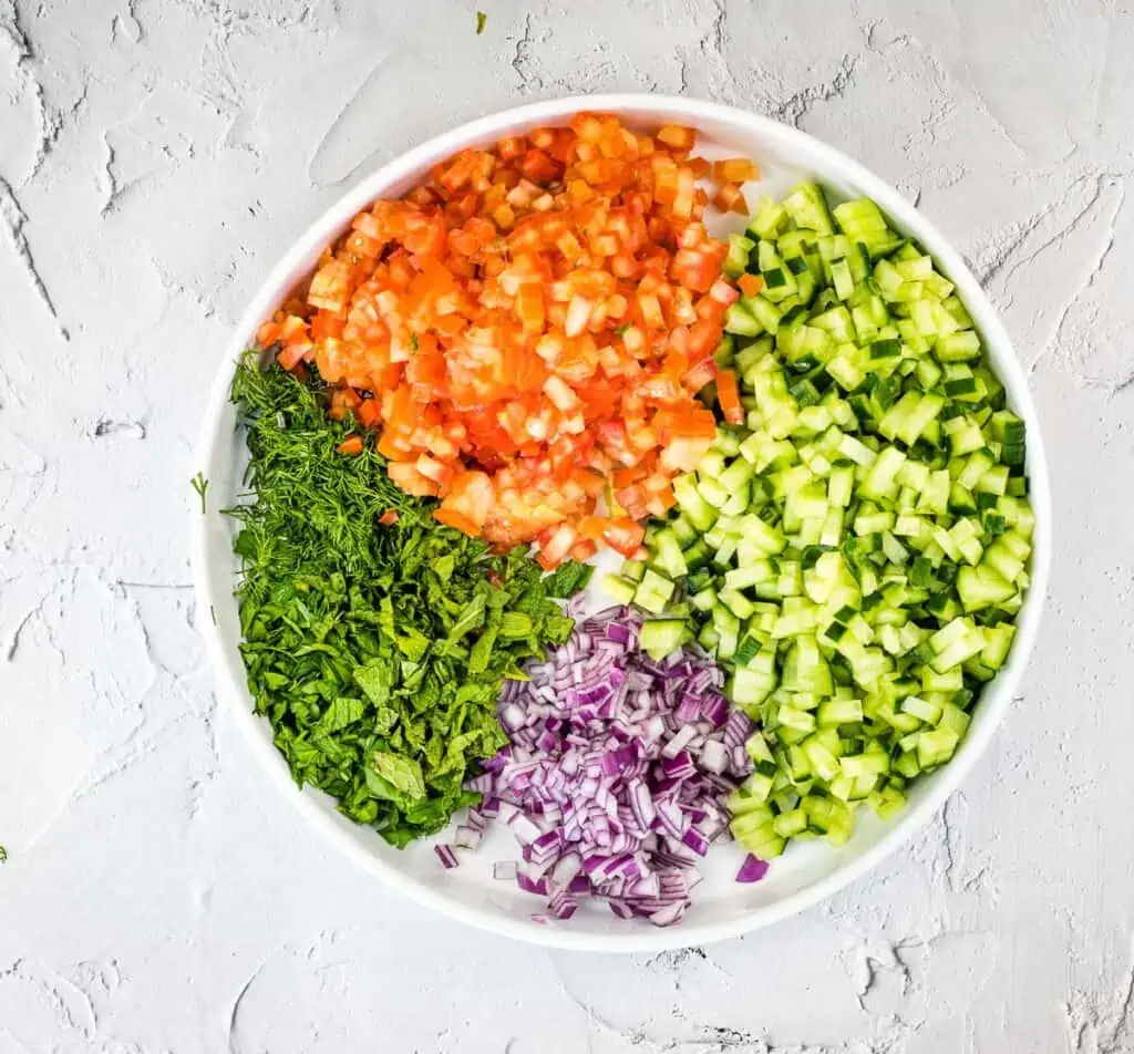 Diced veggies to make Shirazi Salad.