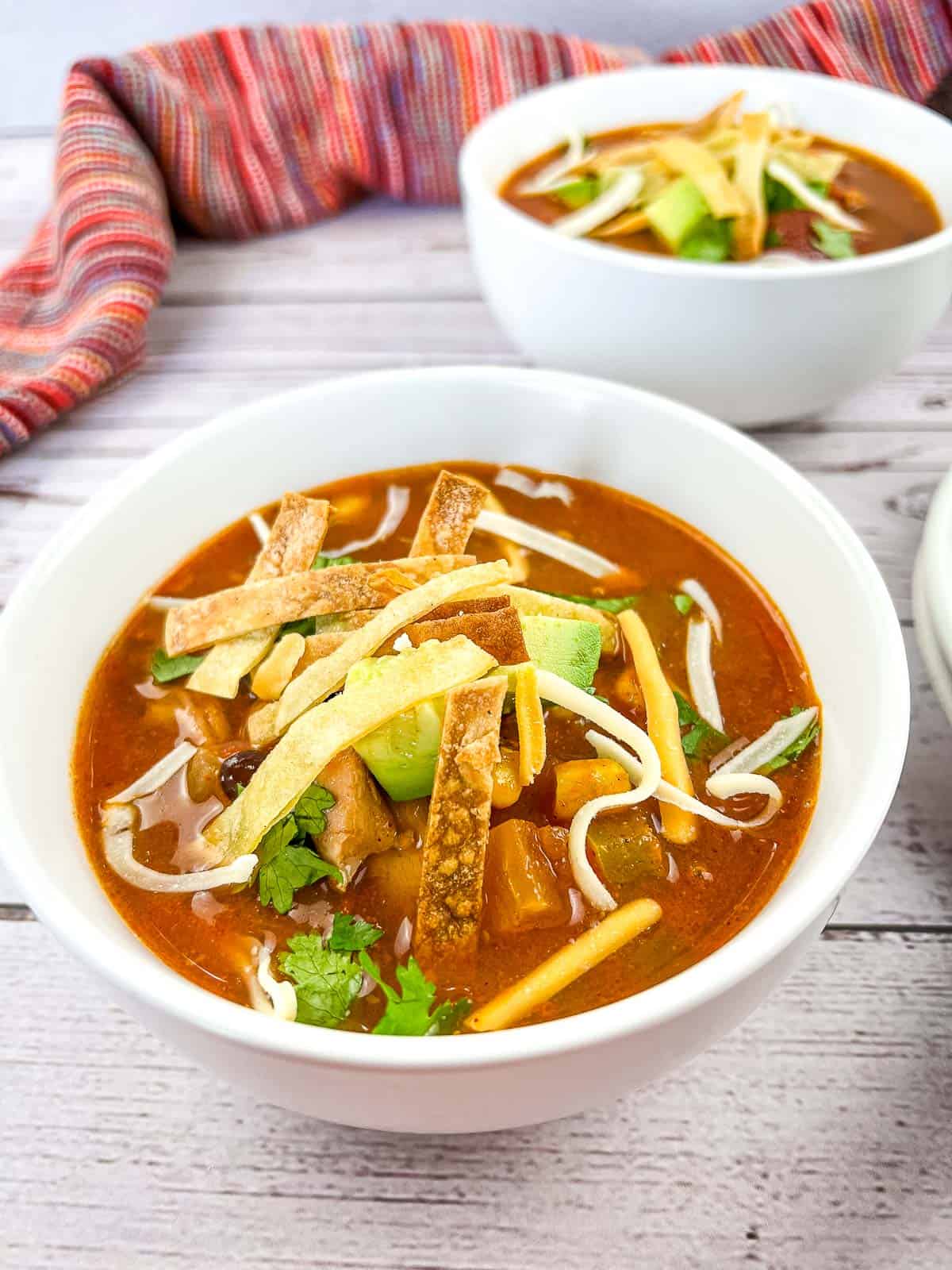 https://cookwhatyoulove.com/wp-content/uploads/2022/09/smoked-chicken-tortilla-soup-finished-2v.jpg