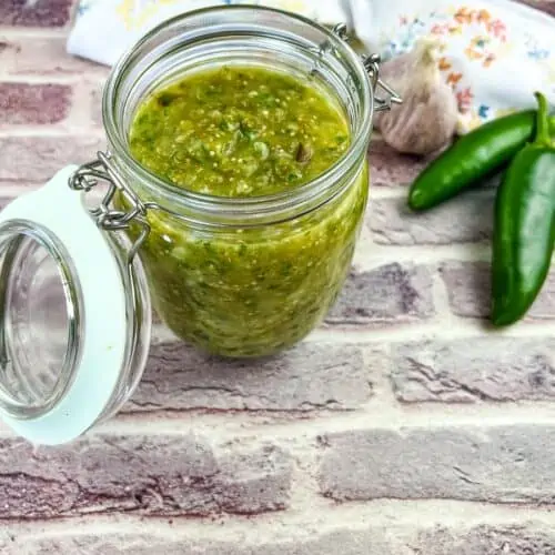 Tomatillo Sauce in a glass jar.