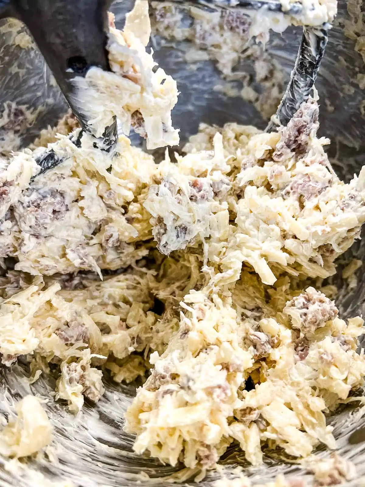 Sausage mixed into the cheese and sauerkraut mixture.
