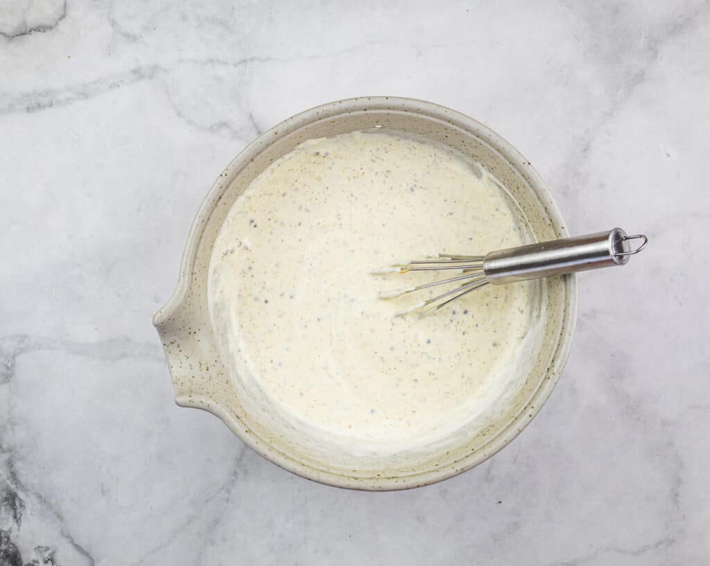 Mixed mustard sauce in a bowl.