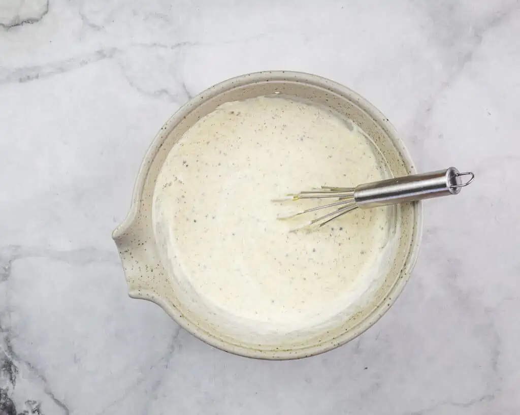 Mixed mustard sauce in a bowl.