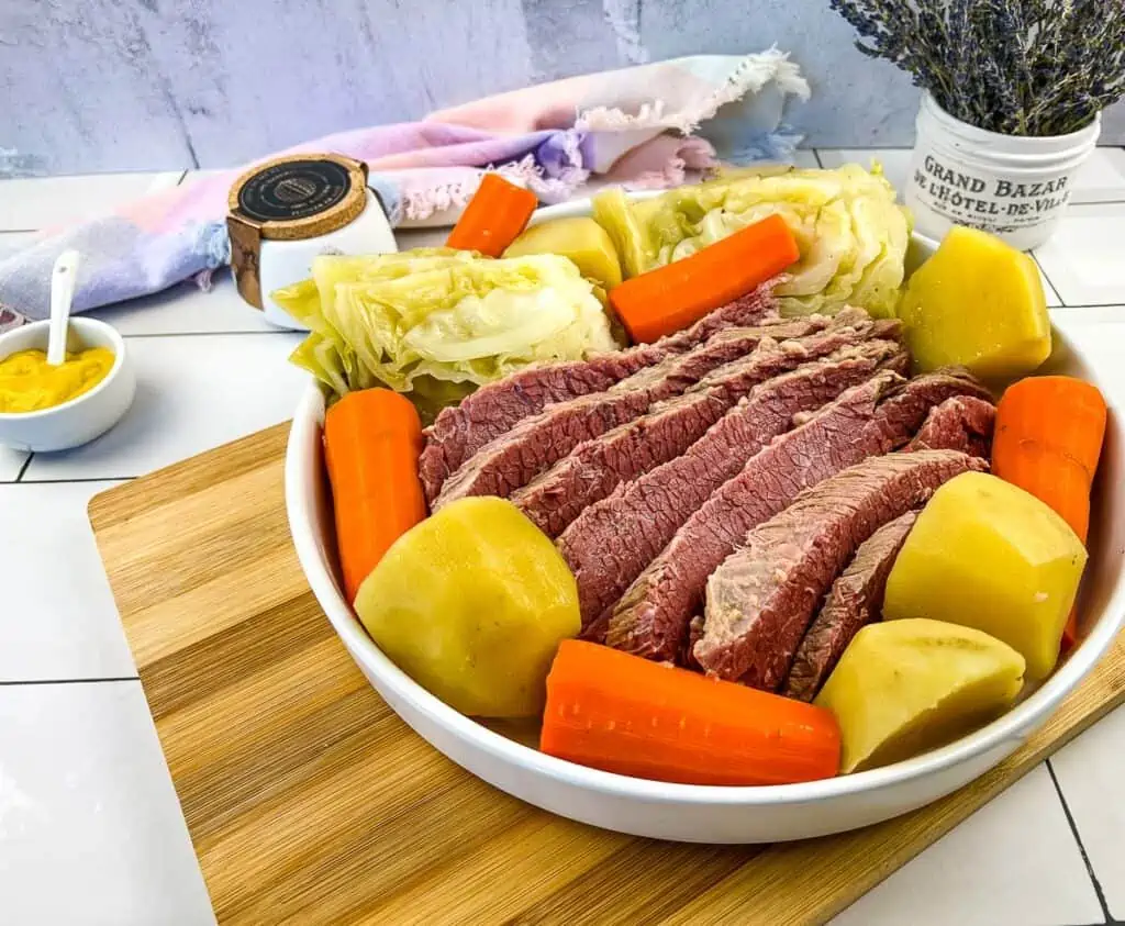 Traditional corned beef dinner with potatoes, carrots and cabbage.