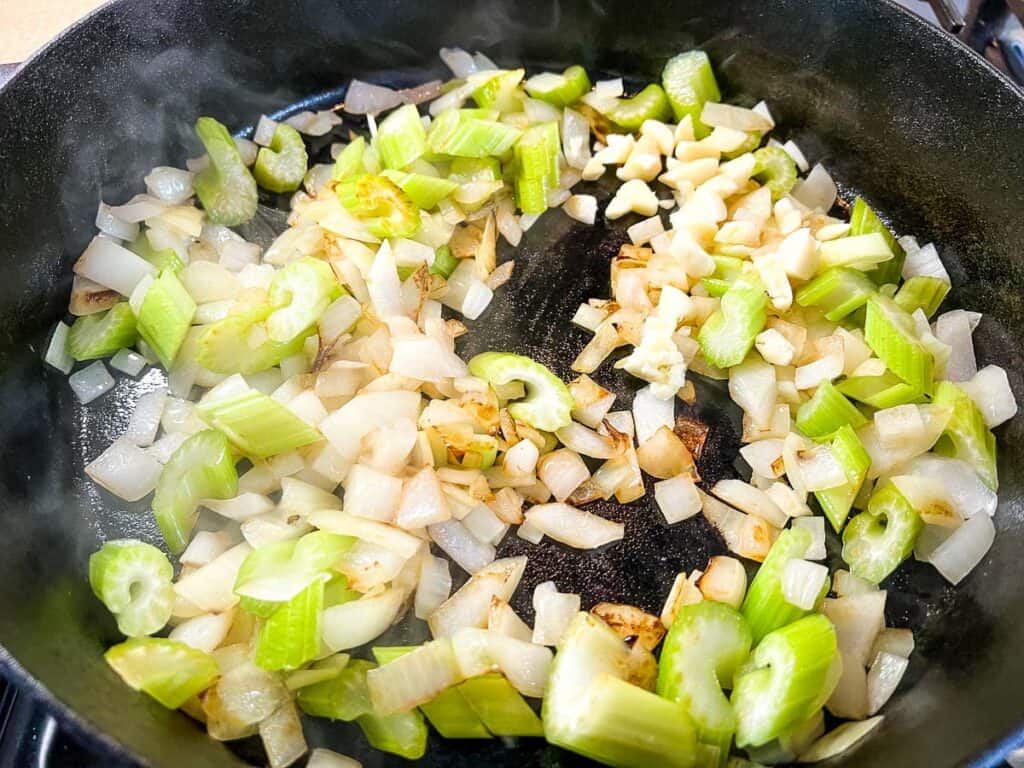 Saute the onions, celery, and garlic.