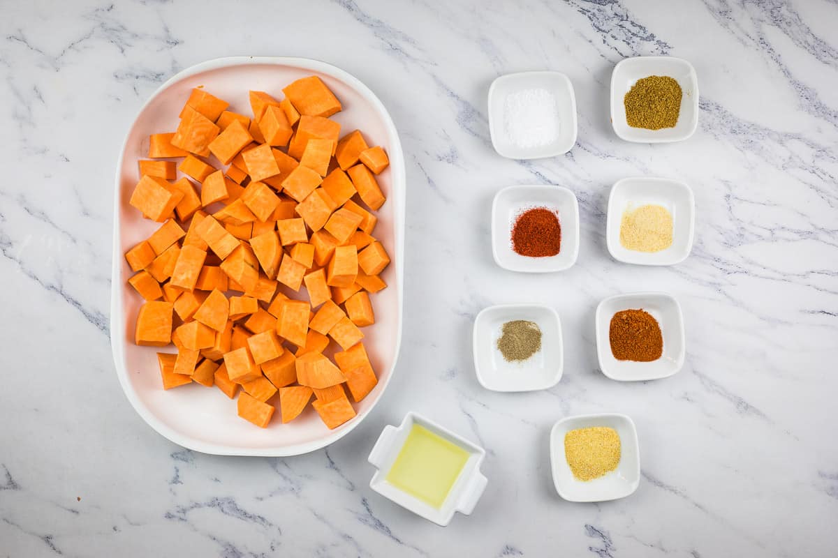 Ingredients to make air fryer sweet potato cubes.
