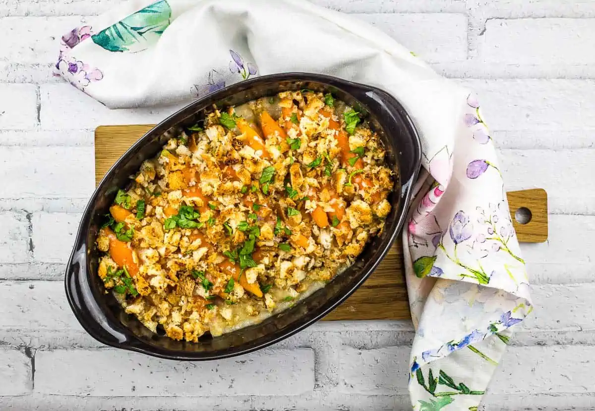 A top-down shot of Carrots au Gratin in a baking dish.