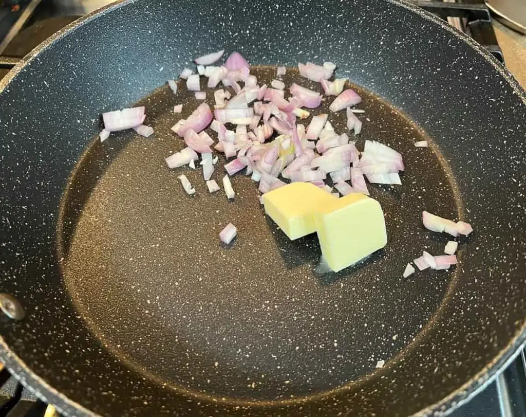 Saute the shallots in butter.