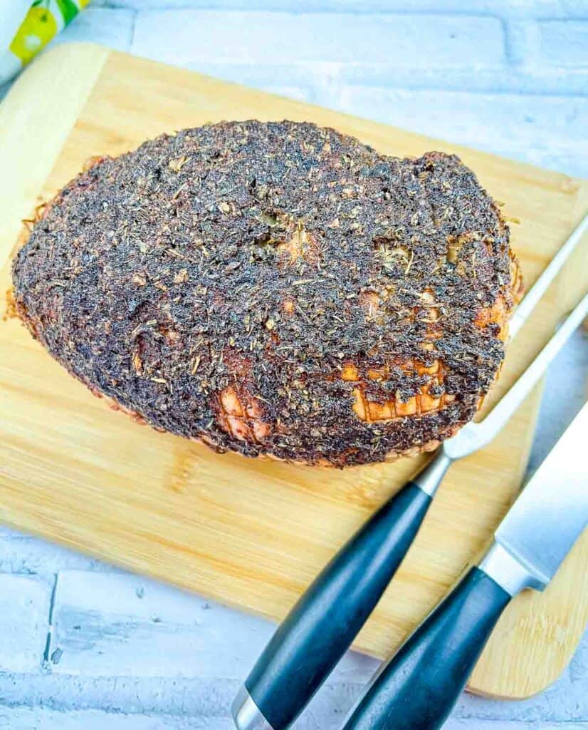 Roasted turkey roll ready for slicing.
