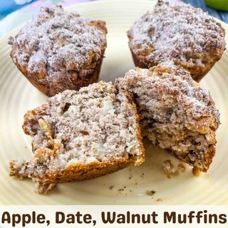 Apple, Date, Walnut Muffins on a plate.