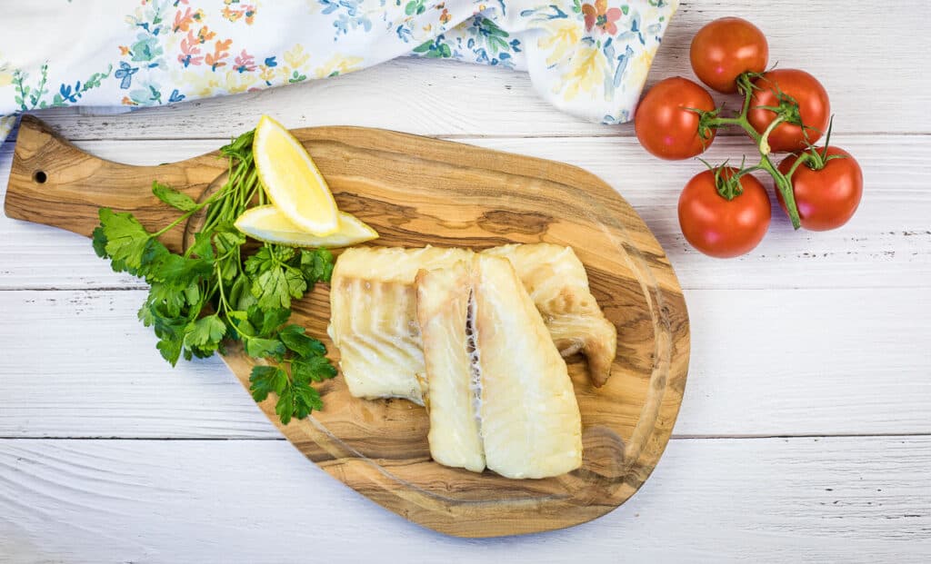 Easy Smoked Cod on a chopping board.