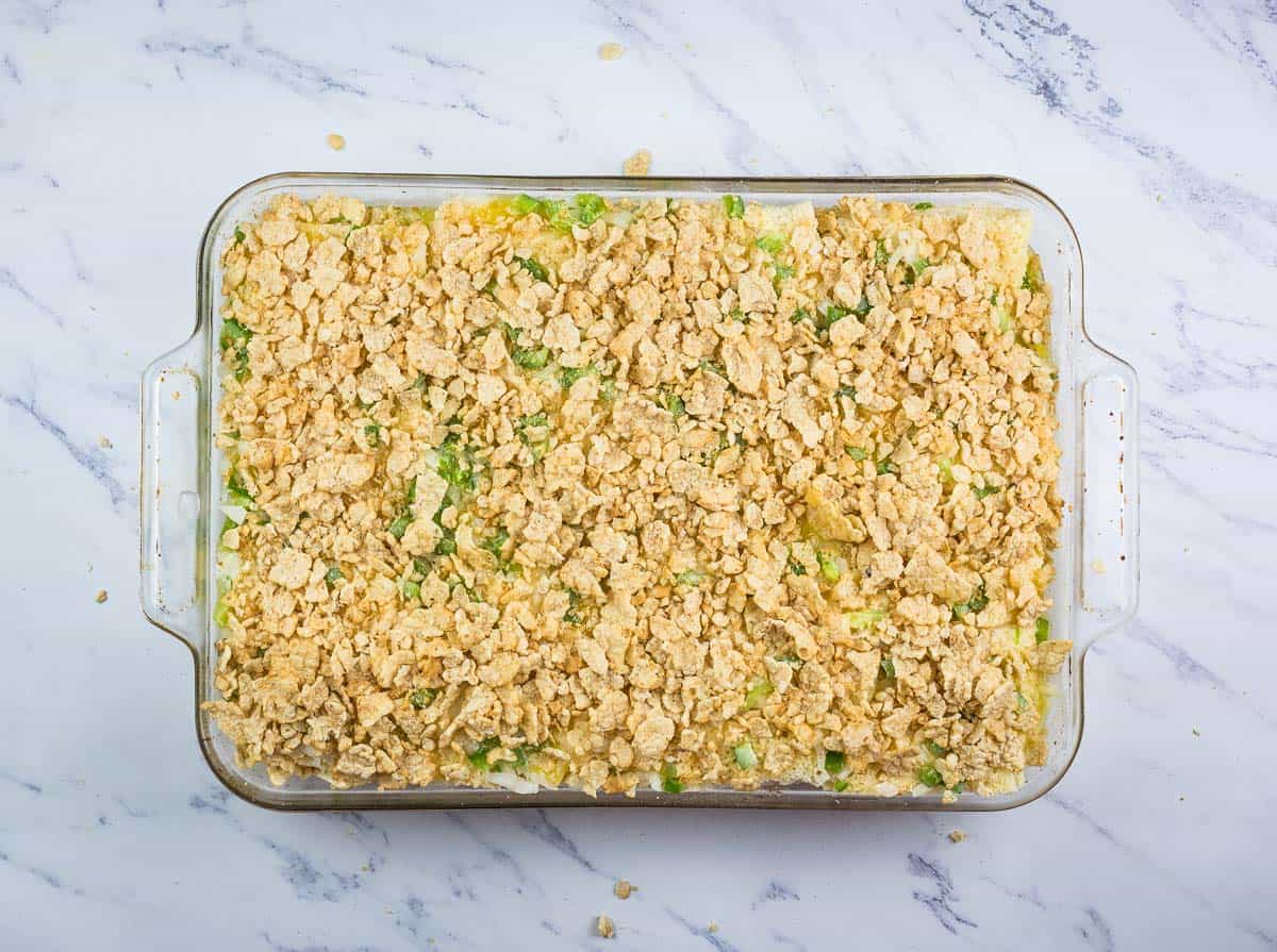 Soaked casserole topped with cereal crumbs and butter.