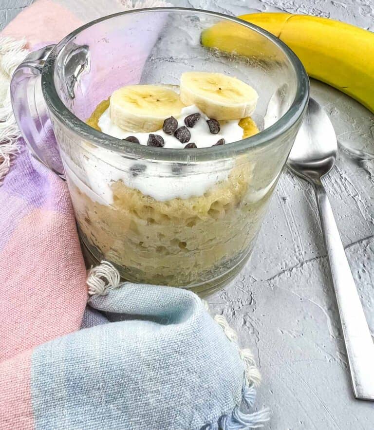Banana Chocolate Chip Mug Cake with bananas and chips on top.