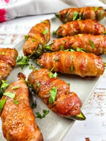 Pork Stuffed Smoked Jalapeno Poppers on a plate.