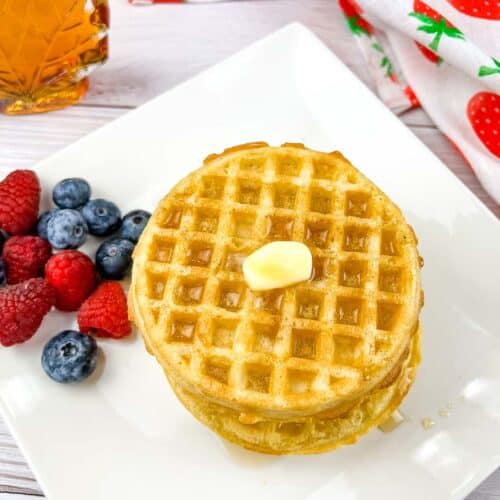 A stack of waffles heated up in the air fryer.