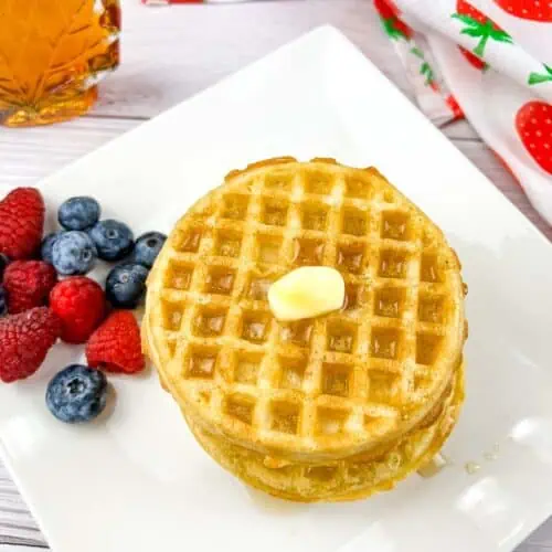 A stack of waffles heated up in the air fryer.