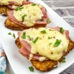 Lazy air fryer chicken cordon bleu on a white plate.