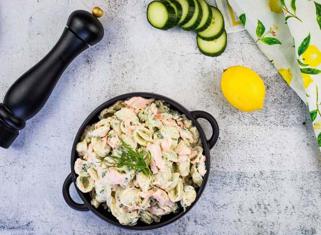 Salmon Pasta Salad in a black serving bowl.