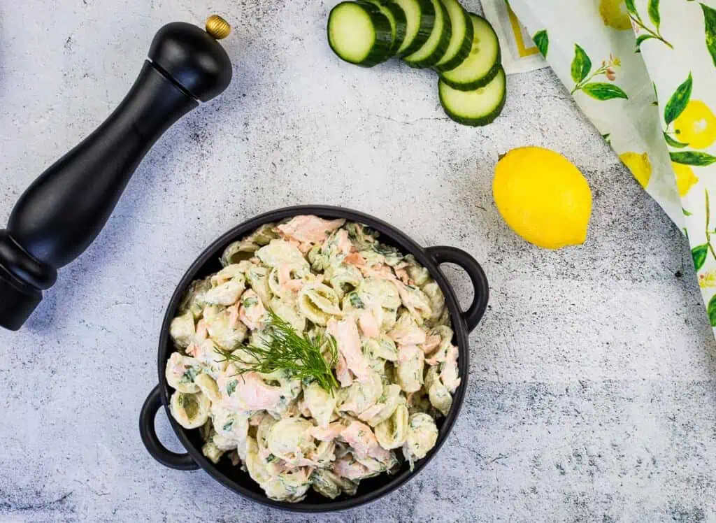 Salmon Pasta Salad in a black serving bowl.