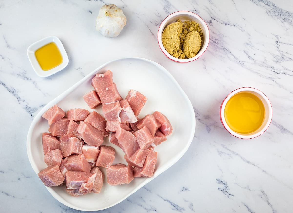 Ingredients to marinate the meat for smoked pork kabobs with pineapple.
