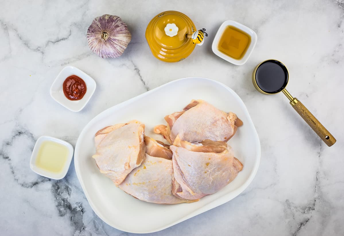 Ingredients to make air fryer honey garlic chicken thighs.