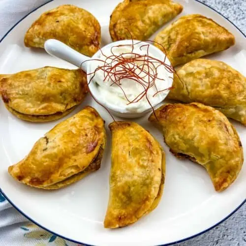 Air fryer beef empanadas on a plate.