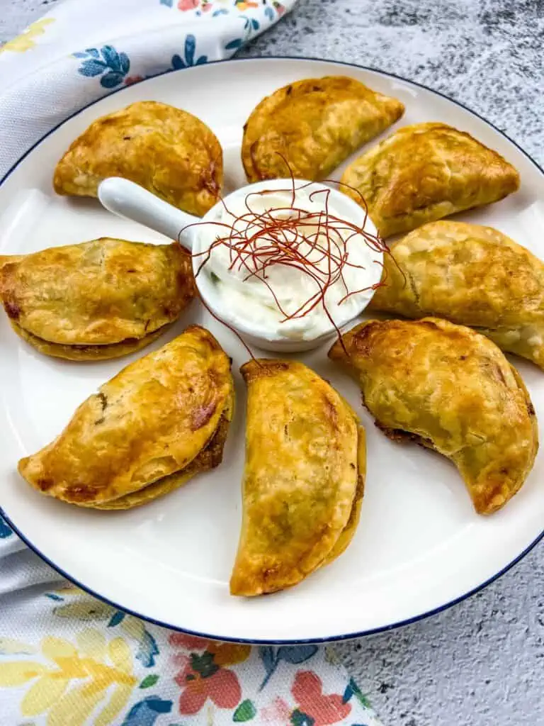 Air fryer beef empanadas on a plate.