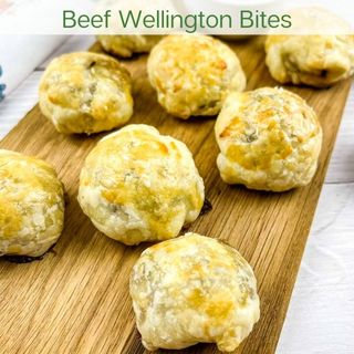 Beef Wellington Bites on a board.