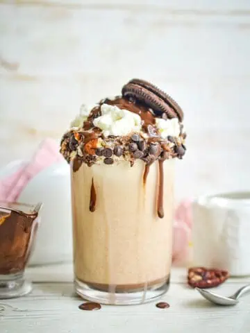 Finished Cookie Dough Milkshake in a glass.