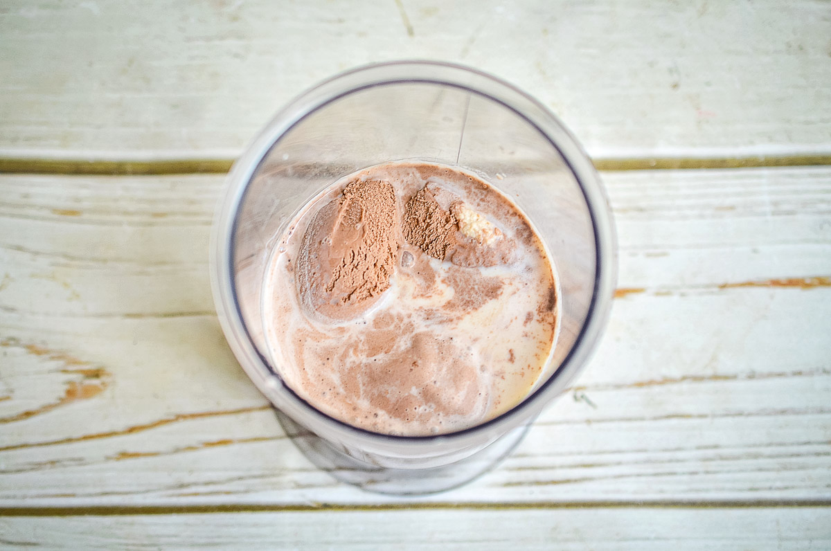 Milk and ice cream in a blender.