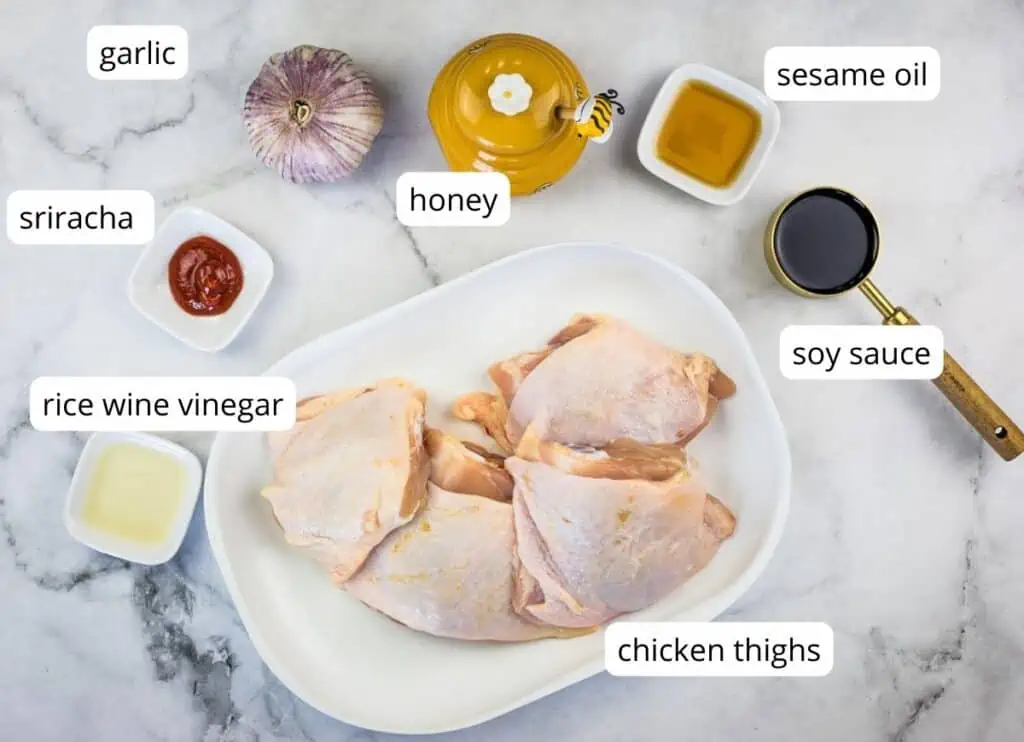 Labeled ingredients to make air fryer honey garlic chicken thighs.