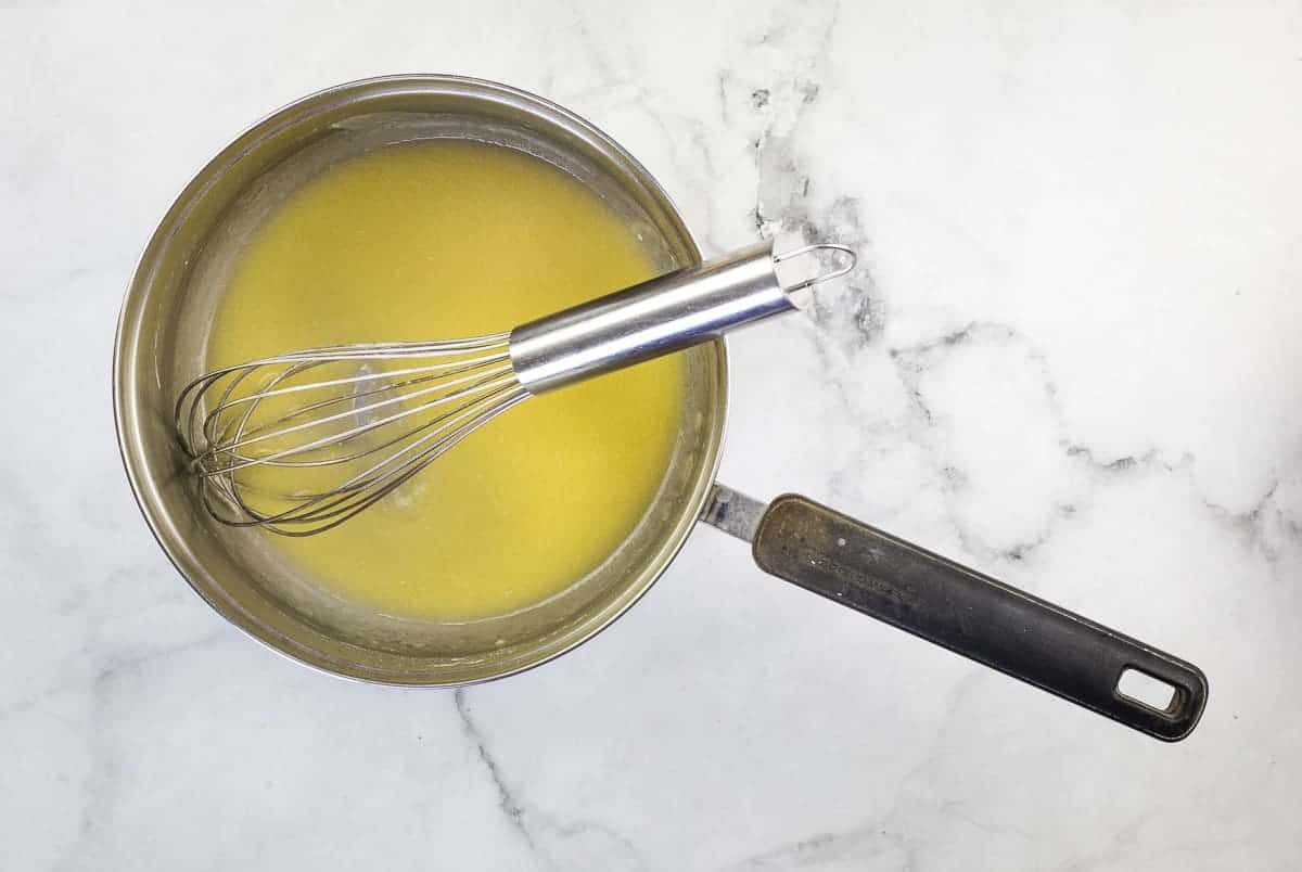Melted butter and flour in a saucepan.