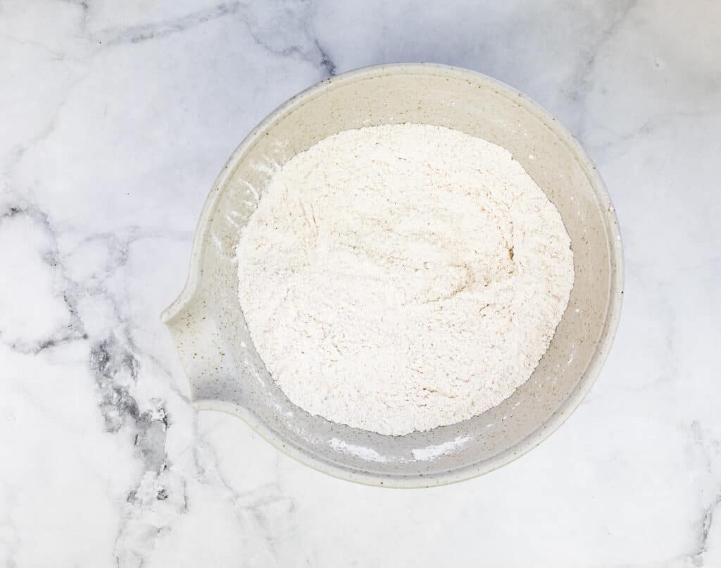 Dry ingredients mixed in a bowl.