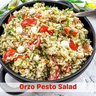 Orzo Pesto Salad in a black serving bowl.