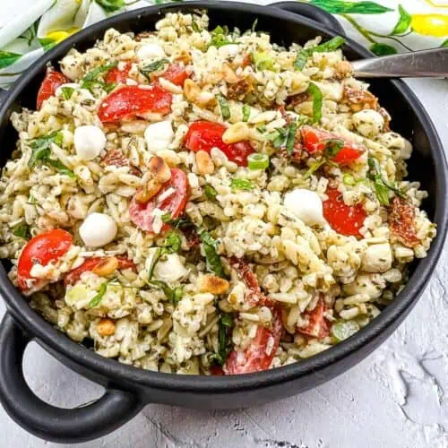 Pesto Orzo Salad in a black serving bowl.