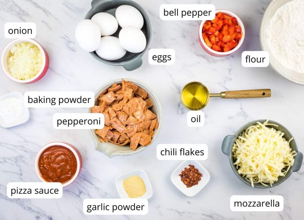 Labeled ingredients to make Pizza Muffins.