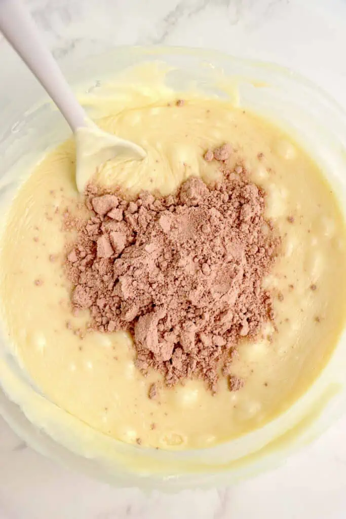 Red velvet cake mix added to melted chocolate mixture.