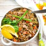 A vertical image of Wheat Berry Salad with Tuna and Tomatoes.