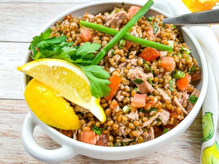 A horizontal image of Wheat Berry Salad with Tuna and Tomatoes.