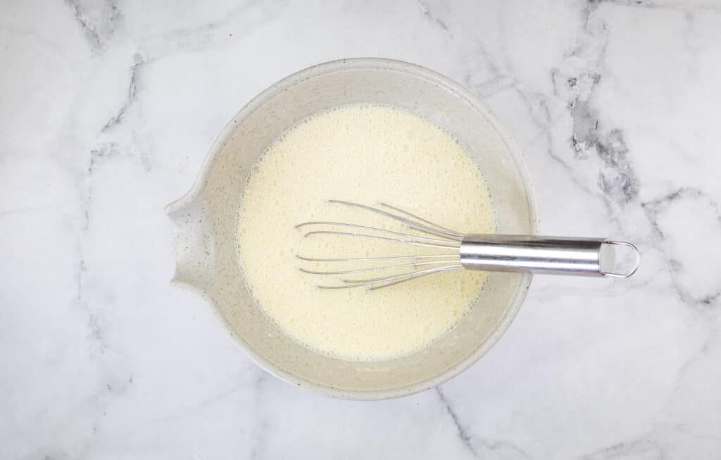 The mixed custard to make Ham & Cheese Impossible Quiche.