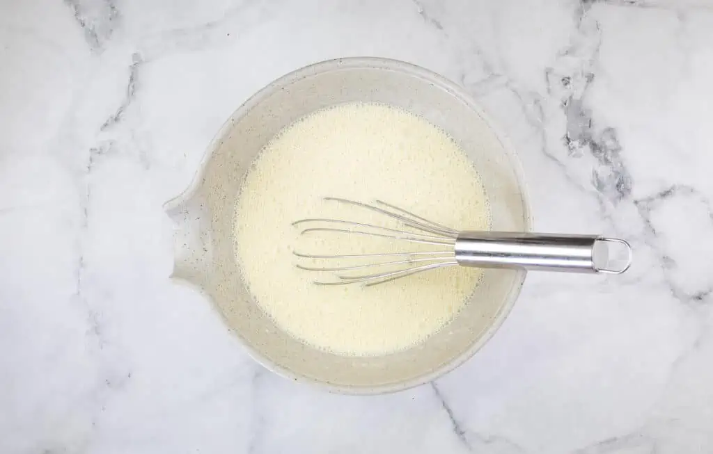 The mixed custard to make Ham & Cheese Impossible Quiche.