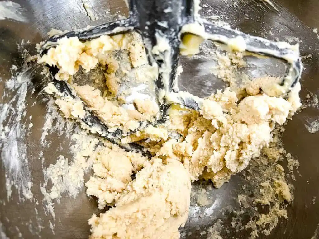 Mixing butter and sugar in a stand mixer.