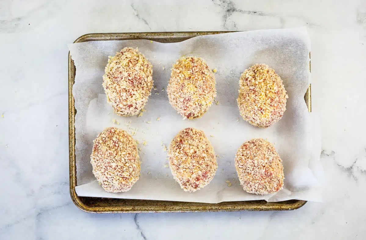 Breaded Scotch Eggs ready for baking.