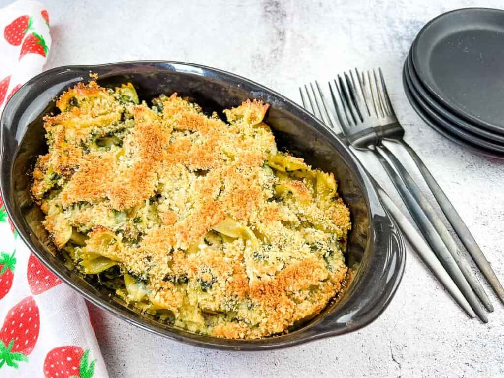 A top-down shot of Chicken Florentine Artichoke Bake in a casserole dish.